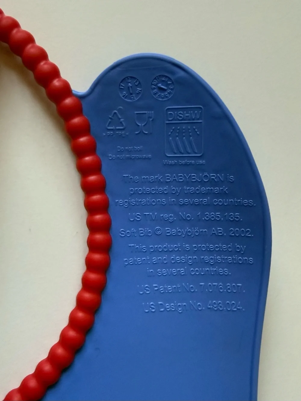 Set of 2 BabyBjorn Feeding Bibs - Blue & Yellow